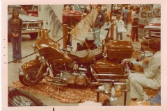 76 Glide at bike show, won first place for custom paint on stock bike. (my artist Cheli in left side of photo)